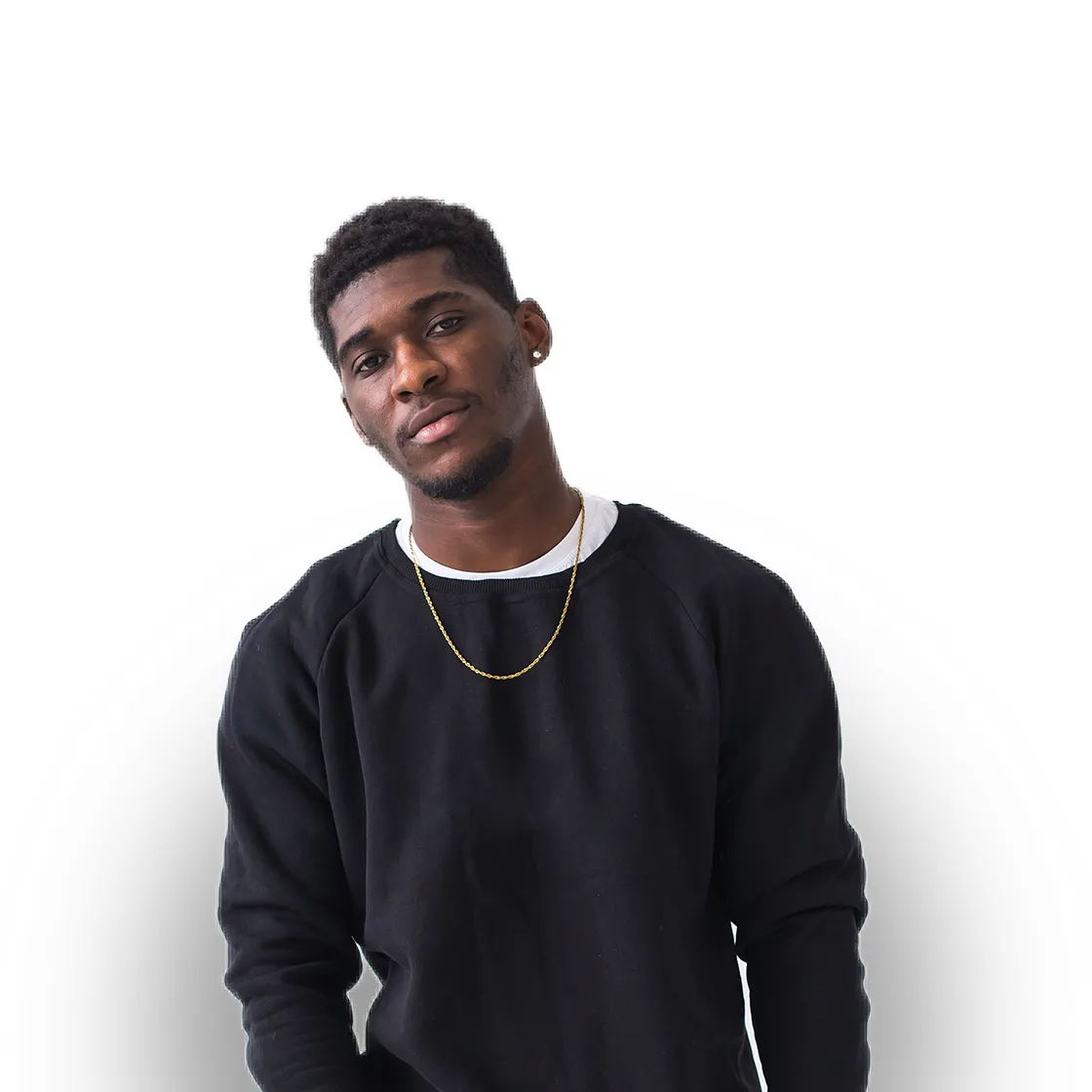 Black male model in black sweatshirt posing against white background.